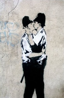 Kissing Coppers Poster by Banksy